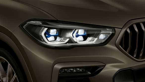 BMW Laserlight. Zbliżenie na BMW X6 z widokiem reflektorów Laserlight.