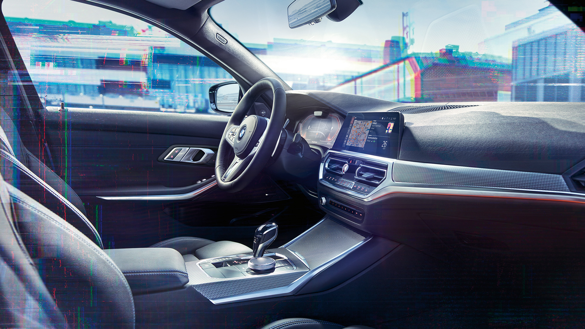 BMW serii 3 Series Limuzyna, panel sterowania M. combination with M-specific display.Lorem ipsum. Zblizenie na wnętrze BMW serii 3 Limuzynę z bocznym widokiem na deskę rozdzielczą i panel sterowania z wyświetlaczem M.
