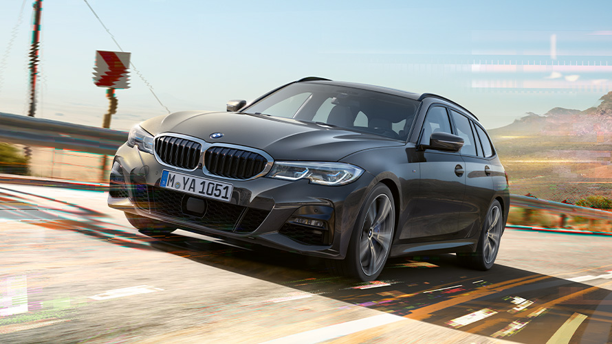 BMW serii 3 Touring (G21), szary drawit, przedni półprofil BMW serii 3 Touring (G21), szary drawit, przedni półprofil podczas jazdy w wiejskim otoczeniu