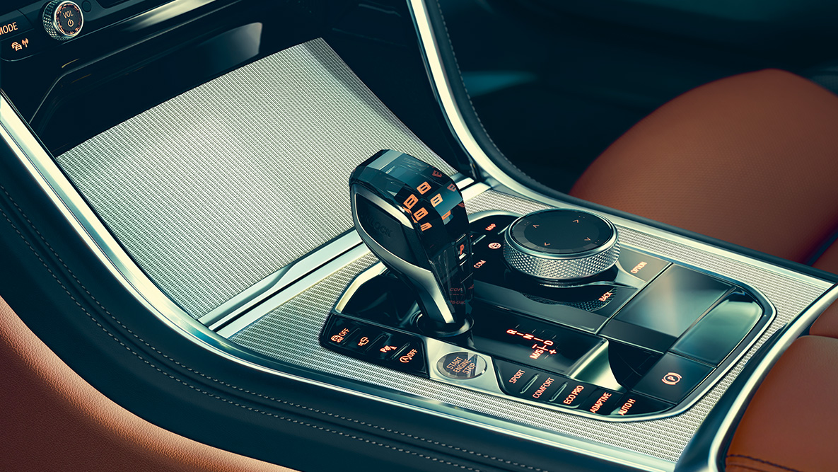 BMW serii 8 Coupé, aplikacje szklane. Zbliżenie aplikacji szklanych we wnętrzu BMW serii 8 Coupé.