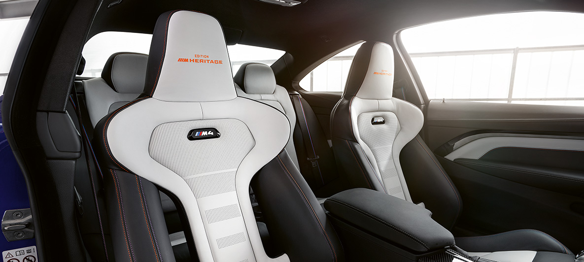 BMW M4 Coupé, M Heritage Edition fotele M Sport w Bicolour Silverstone / Black with contrast seams in Violet and Orange BMW M4 Coupé, M Heritage Edition, edycja specjalna, fotele M Sport in Bicolour Silverstone / Black with contrast seams in Violet and Orange