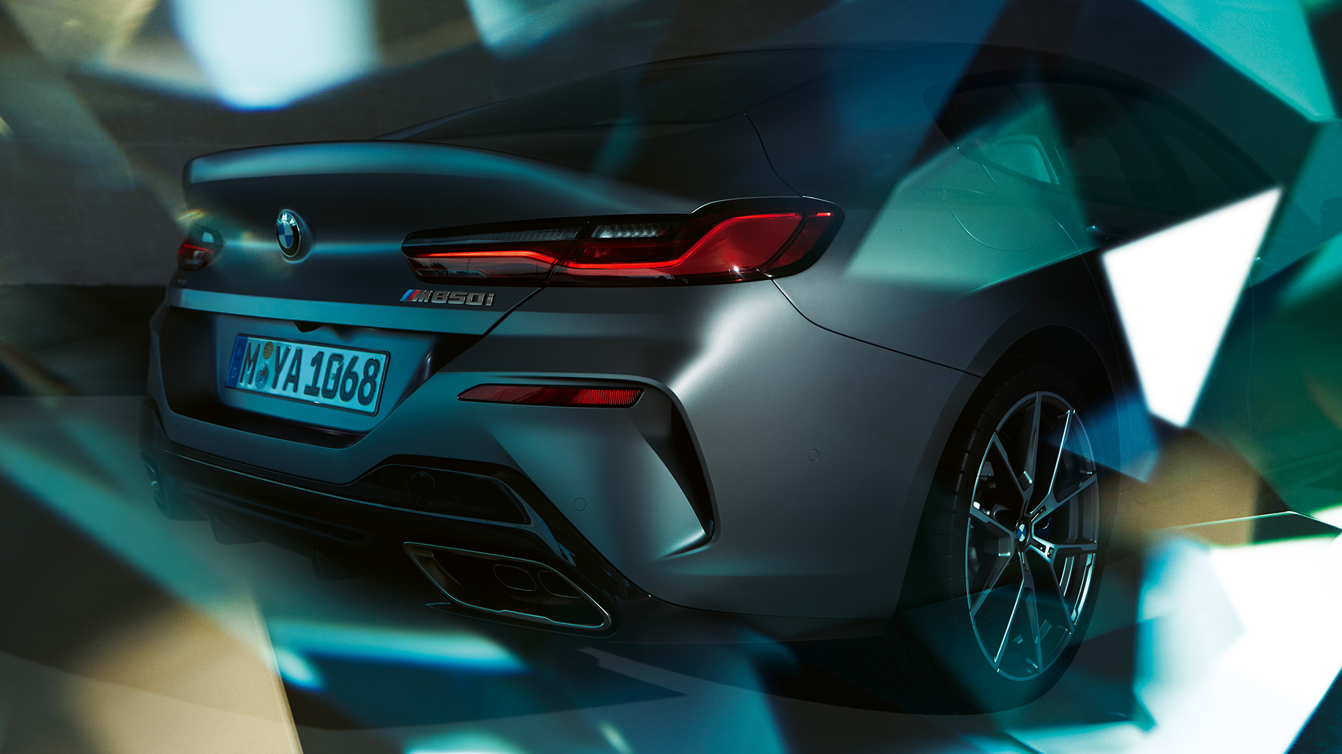 BMW M850i xDrive Gran Coupé, zbliżenie tyłu BMW M850i xDrive Gran Coupé G16 2019 w metalizowanym kolorze mroźnego bazaltu BMW Individual, zbliżenie tyłu