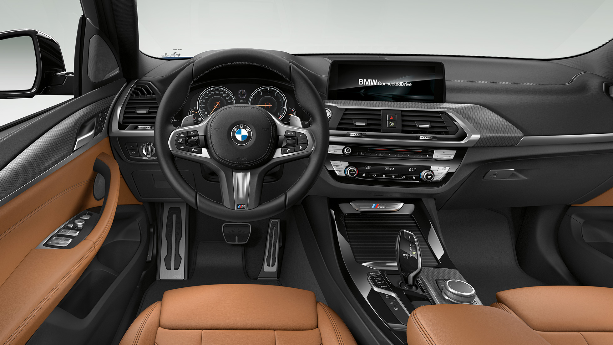 BMW X3 M40i oraz BMW X3 M40d, kokpit. BMW X3 M40i oraz BMW X3 M40d, wnętrze, kokpit ze skórzaną kierownicą M i fotele sportowe M.