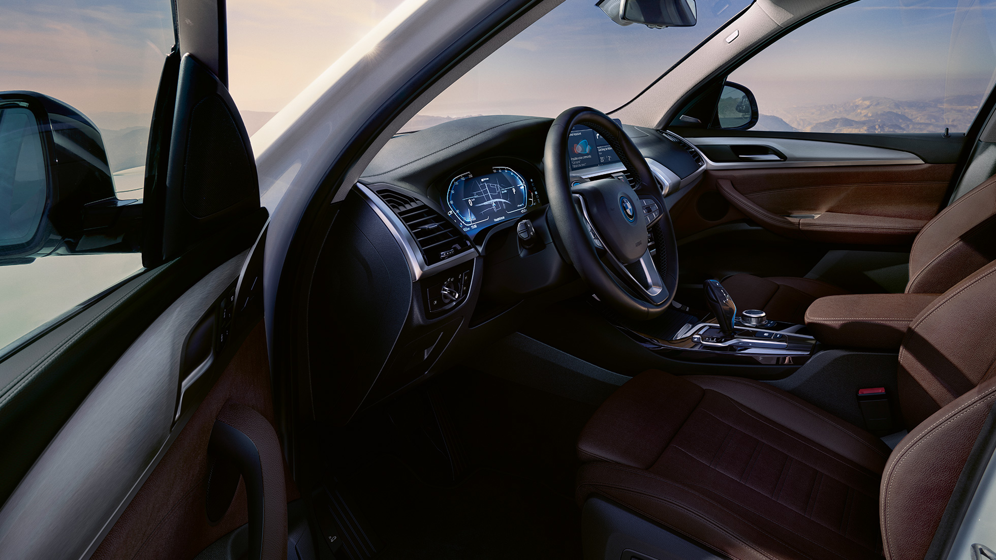 Kokpit BMW iX3 G08, widok z otwartymi drzwiami Kokpit BMW iX3 G08 2020, biel mineralna, metalizowany, widok z otwartymi drzwiami
