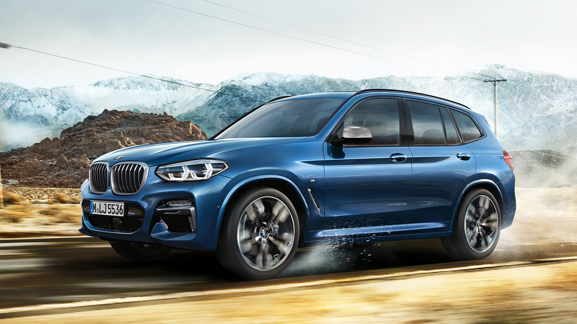 BMW X3 M40i, Kotflügel vor Gebirge BMW X3 M40i, Kotflügel vor Gebirge