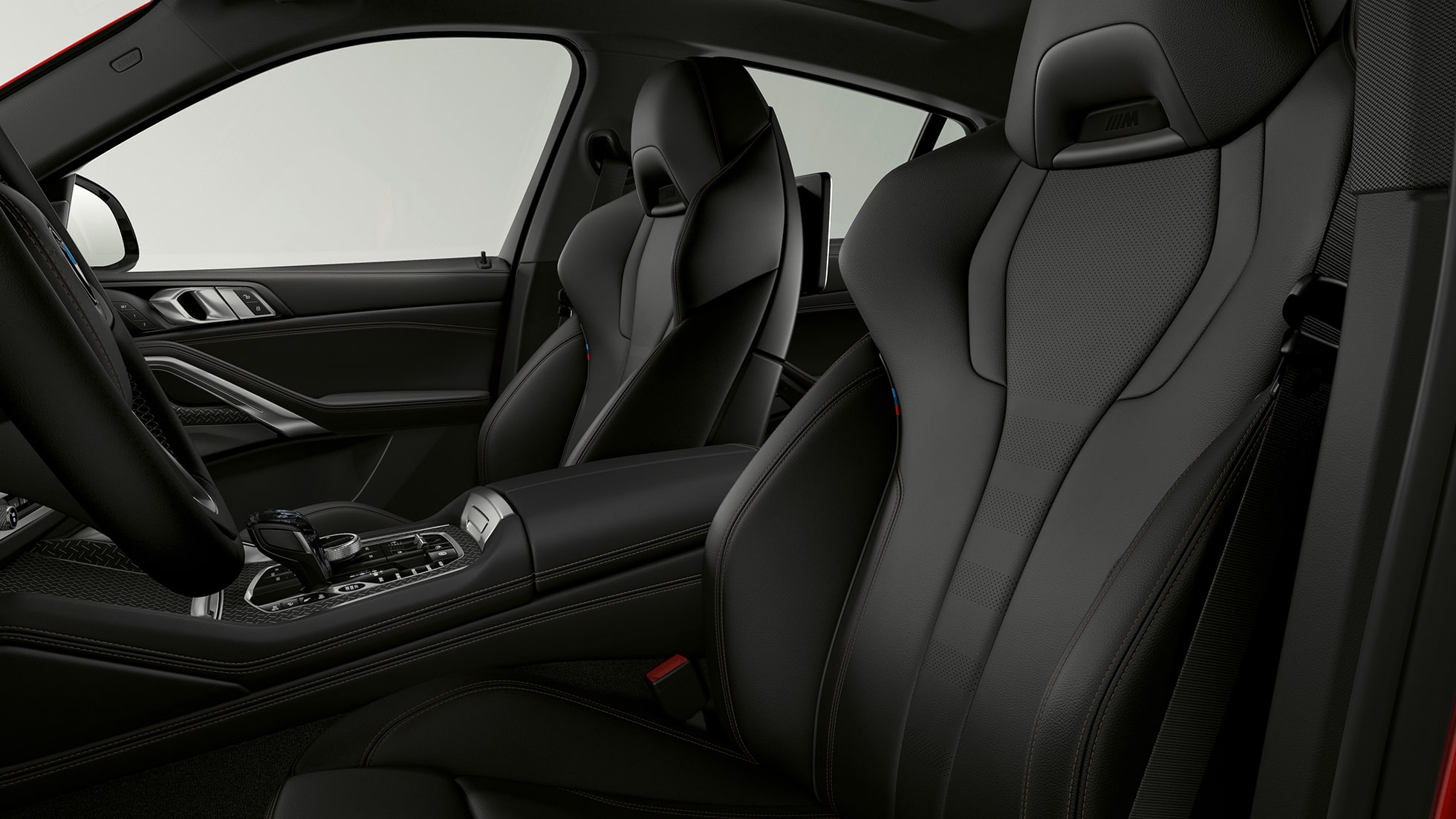 BMW X6 w wariancie BMW xLine, tapicerka. Wnętrze BMW X6 w wariancie BMW xLine z widokiem tapicerki.