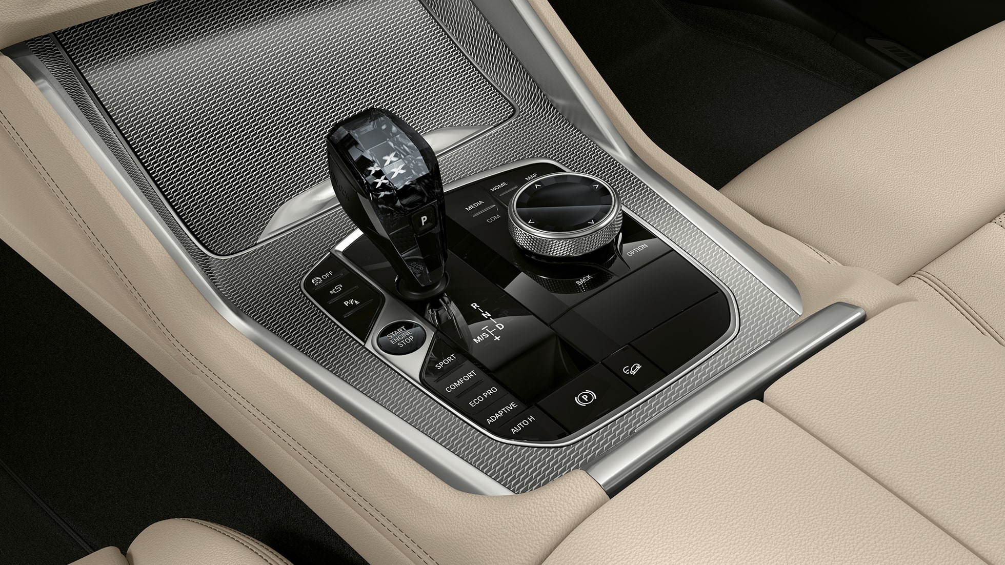 BMW X6 z pakietem M Sport, konsola środkowa. Wnętrze BMW X6 z pakietem M Sport z widokiem konsoli środkowej.