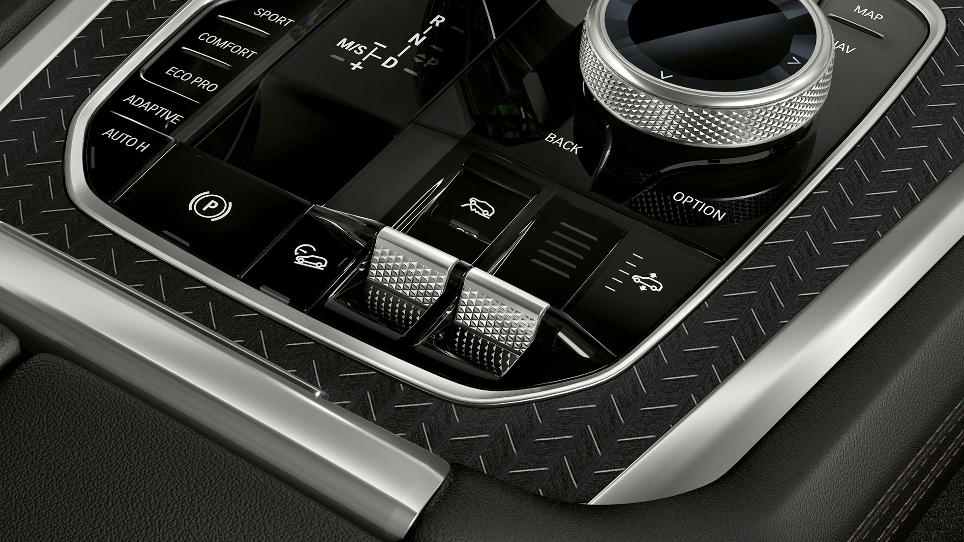 Konsola środkowa BMW X6. Zbliżenie na wnętrze BMW X6 z widokiem konsoli środkowej.